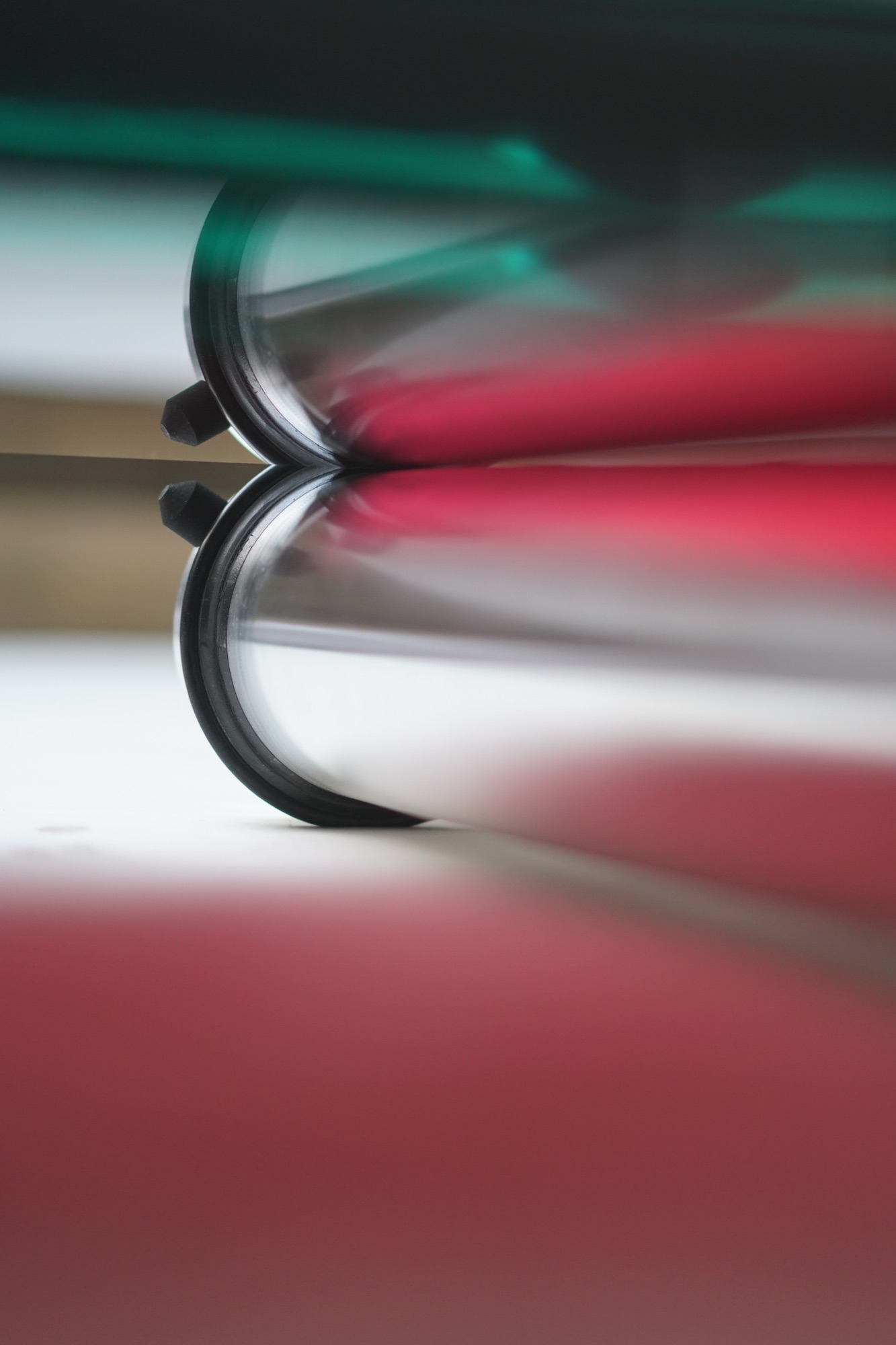 wave chamber — liquid-filled glass pane with shifting color gradients